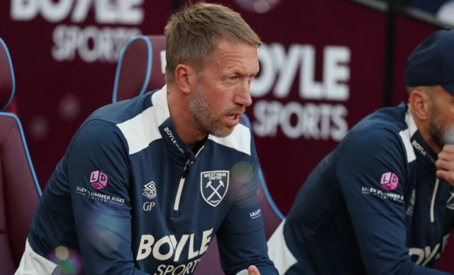 West Ham United manager Graham Potter looks on