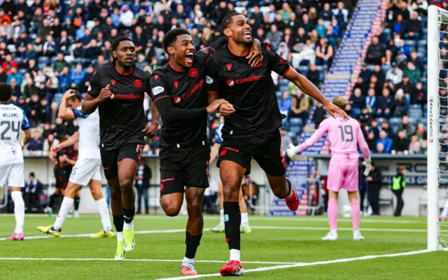 St Mirren's Mikael Mandron (R) celebrates scoring to make it 2-0 with teammate Jayden Richardson during a William Hill Premiership match between Falkirk and St Mirren at the Falkirk Stadium