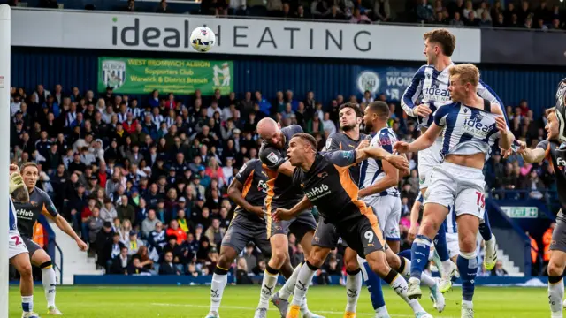 West Brom's Aune Heggebo heads at goal against Derby