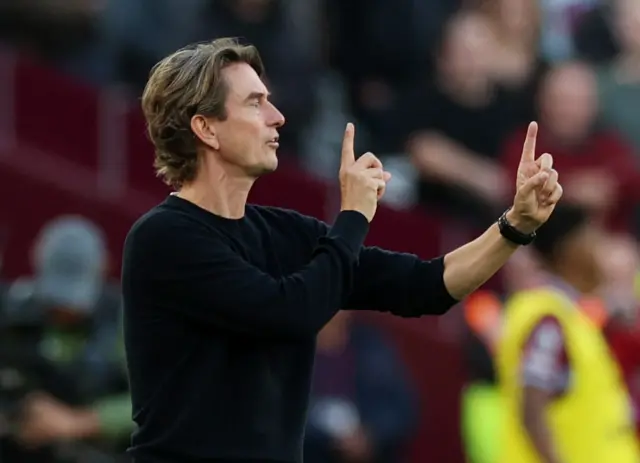 Tottenham Hotspur manager Thomas Frank reacts during the match