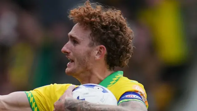 Norwich's Josh Sargent celebrates with ball in hand