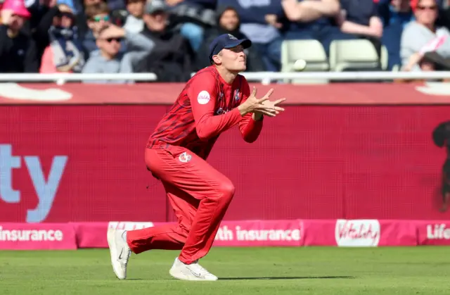 Tom Harltley takes a catch to dismiss Lewis Gregory