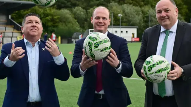 NIFL chief executive Gerard Lawlor, Communities Minister Gordon Lyons and IFA president Conrad Kirkwood