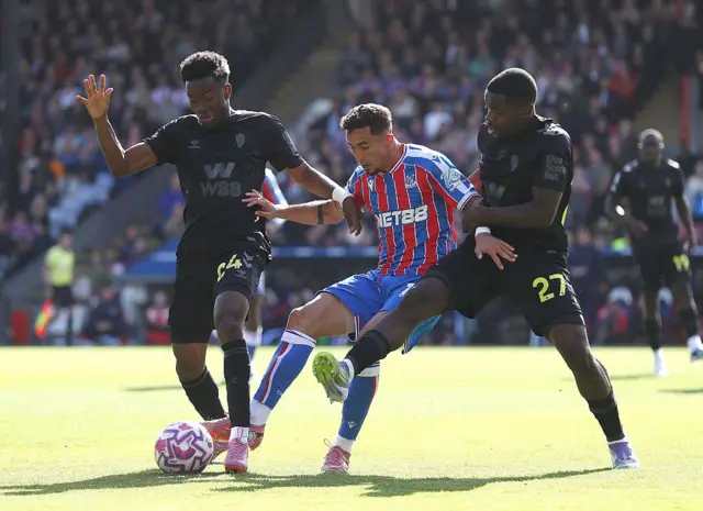 Yeremi Pino of Crystal Palace battles for the ball with Simon Adingra & Noah Sadiki of Sunderland during the Premier League match between Crystal Palace and Sunderland at Selhurst Park