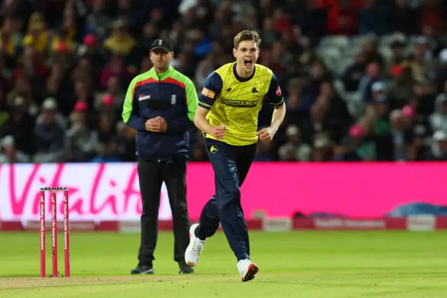 Scott Currie celebrates the wicket of James Rew