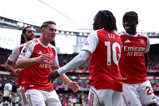 Arsenal's Swedish striker #14 Viktor Gyokeres celebrates scoring the team's second goal with Arsenal's English midfielder #10 Eberechi Eze