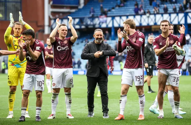 Hearts players salute their fans at Ibrox
