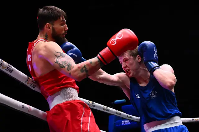 Rami Kiwan from Bulgaria in red Callum Makin from England in blue during the World Boxing Championships Semi finals