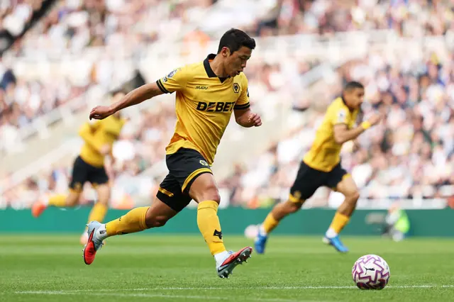 Hee-chan Hwang of Wolverhampton Wanderers runs with the ball during the Premier League match between Newcastle United and Wolverhampton Wanderers at St James' Park on September 13, 2025 in Newcastle upon Tyne, England.