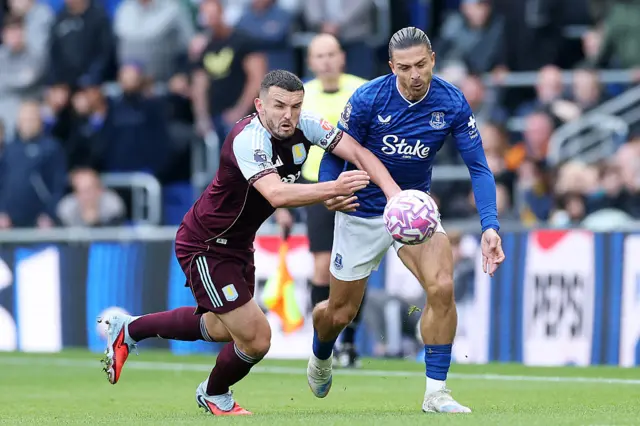 John McGinn of Aston Villa battles for possession with Jack Grealish of Everton during the Premier League match between Everton and Aston Villa at Hill Dickinson Stadium on September 13, 2025 in Liverpool, England. (