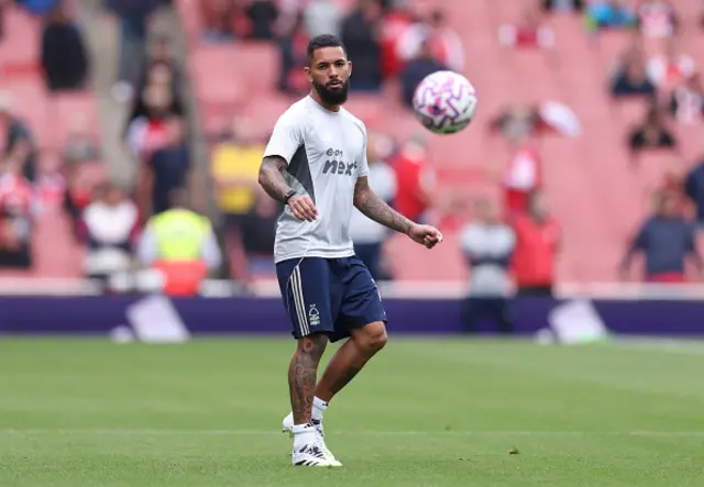Douglas Luiz of Nottingham Forest warms up