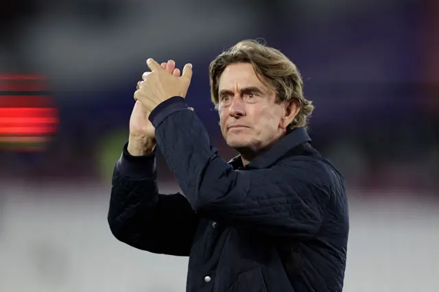 Tottenham Hotspur's Danish head coach Thomas Frank applauds at the end of the English Premier League football match between West Ham United and Tottenham