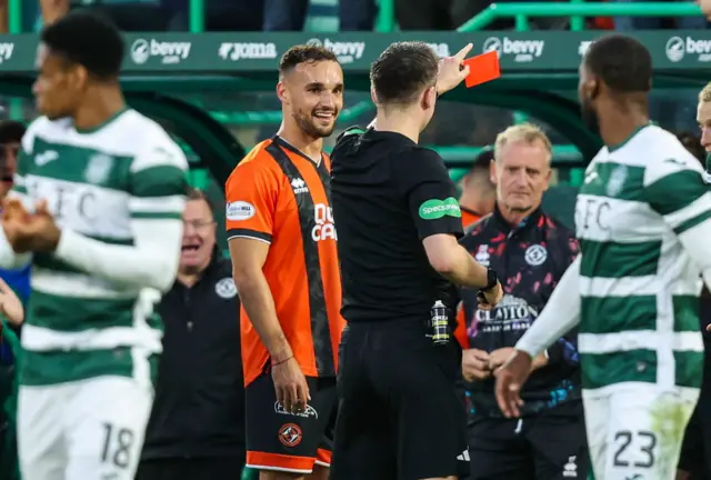 Vicko Sevelj is sent off after conceding a penalty