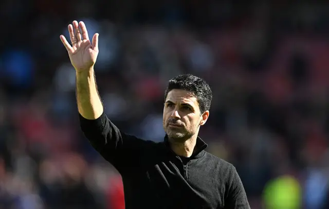 Mikel Arteta, Manager of Arsenal, acknowledges the fans after the team's victory during the Premier League match between Arsenal and Nottingham Forest at Emirates Stadium on September 13, 2025 in London, England.
