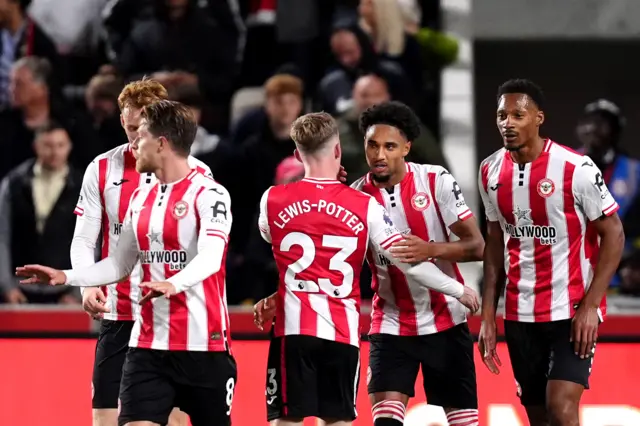 Brentford's Kevin Schade (second right) celebrates