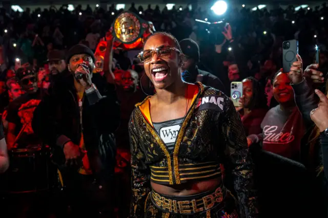 Claressa Shields shouts as she makes her ringwalk