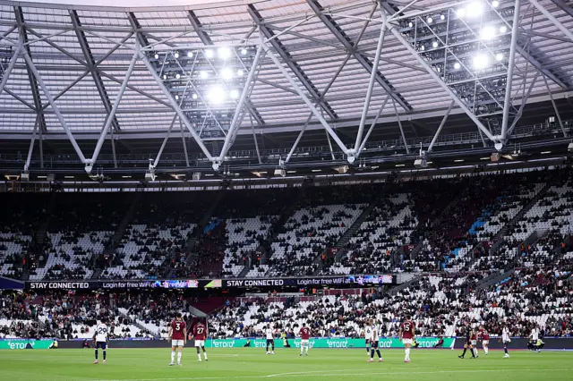 Empty seats are seen in the stadium