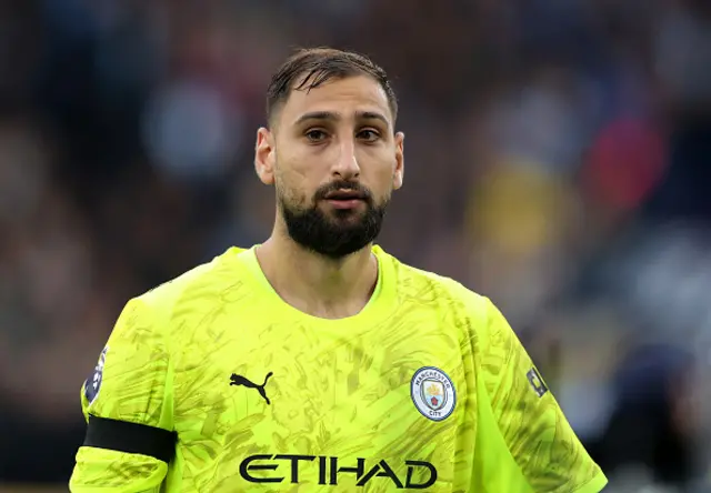 Gianluigi Donnarumma of Manchester City looks on