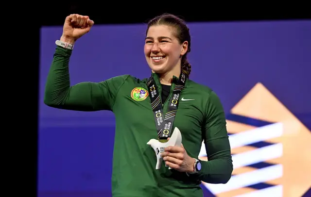 Aoife O'Rourke of Ireland celebrates with her gold medal from the Women's 75kg
