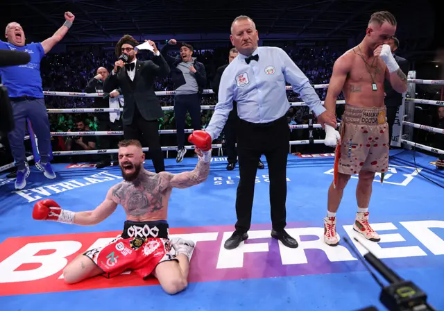 Lewis Crocker falls to this knees celebrating as he is announced the winner