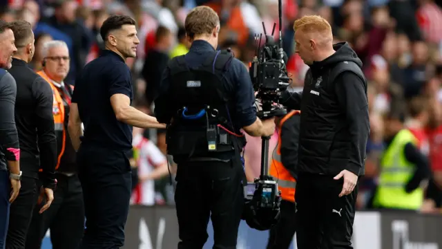 Portsmouth boss John Mousinho and Southampton counterpart Will Still share some disagreement at full-time