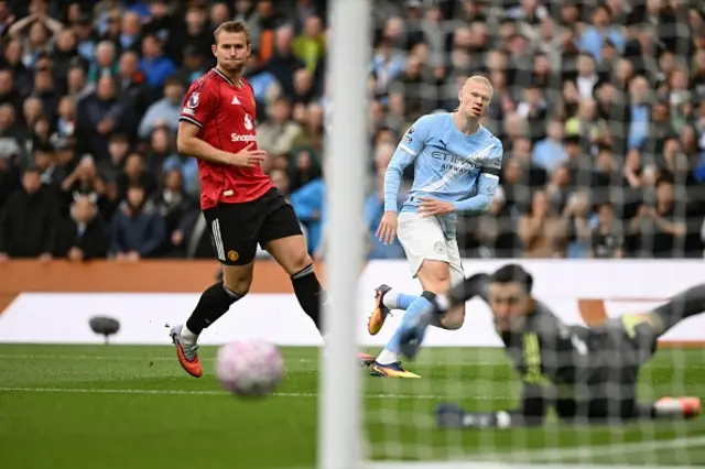 Erling Haaland (C) shoots but misses the target in the first moments