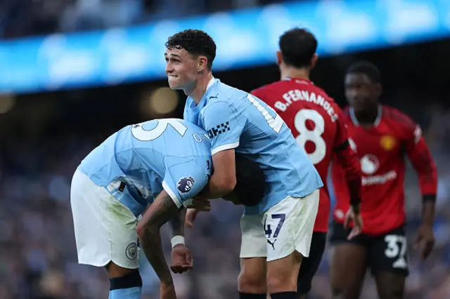 Savio and Phil Foden of Manchester City celebrate