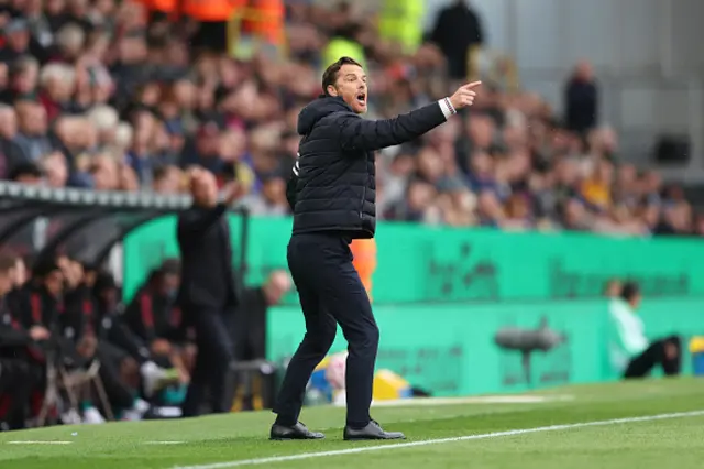 Scott Parker, Manager of Burnley, gives the team instructions