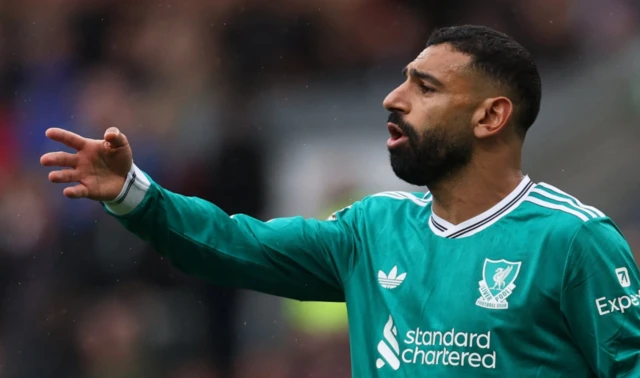 Liverpool's Mohamed Salah reacts