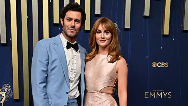 Adam Brody and Leighton Meester walk the carpet