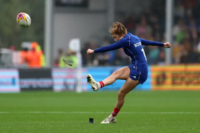 France's full back Morgane Bourgeois kicks a penalty