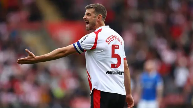 Southampton defender Jack Stephens shouts at his team-mates