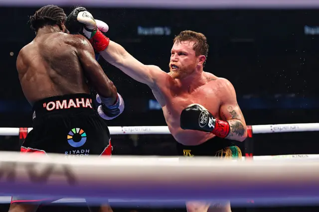 Terence Crawford avoids a punch from Saul Canelo Alvarez