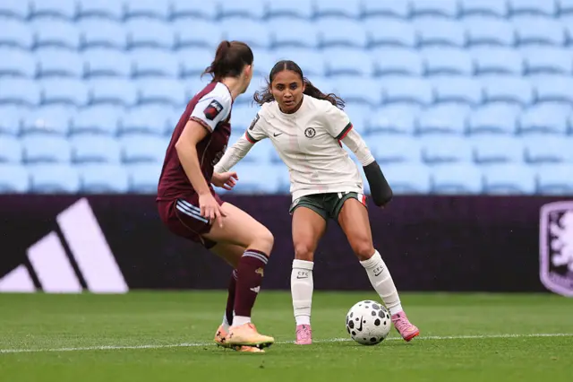 Alyssa Thompson of Chelsea runs with the ball during the Barclays Women's Super League match between Aston Villa and Chelsea FC at Villa Park on September 14, 2025 in Birmingham, England
