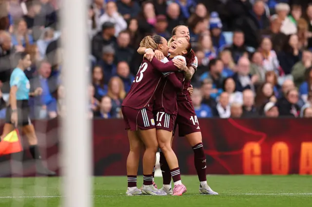 Ebony Salmon of Aston Villa celebrates scoring her team's first goal with teammates during the Barclays Women's Super League match between Aston Villa and Chelsea FC at Villa Park on September 14, 2025 in Birmingham, England.