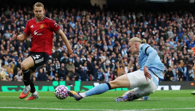 Manchester City's Erling Haaland misses a chance to score