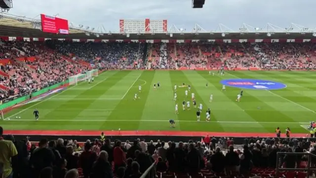 Portsmouth players warm up ahead of the south coast derby