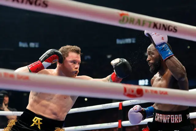 Saul Canelo Alvarez misses a punch with Terence Crawford