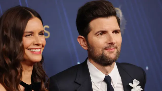 Adam Scott and Naomi Scott
