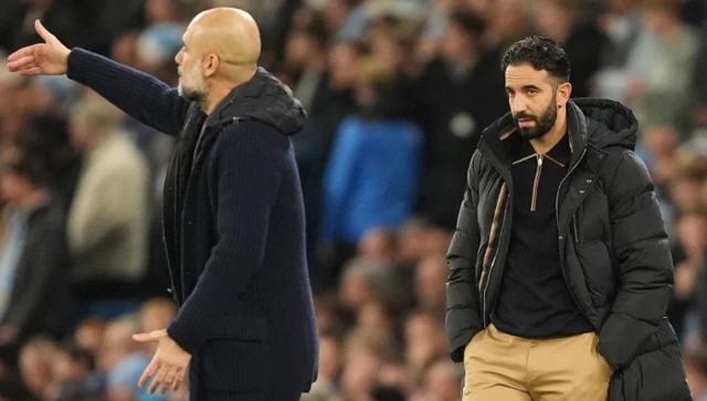 Manchester United manager Ruben Amorim (right) watches on as Manchester City manager Pep Guardiola
