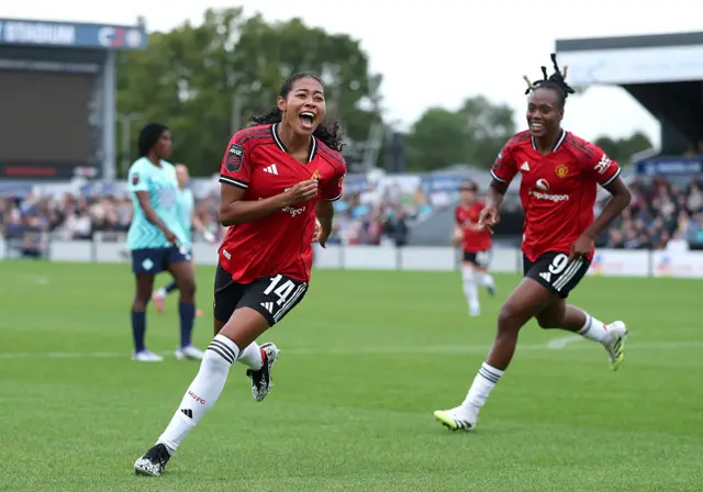 Jayde Riviere of Manchester United celebrates scoring her team's second goal