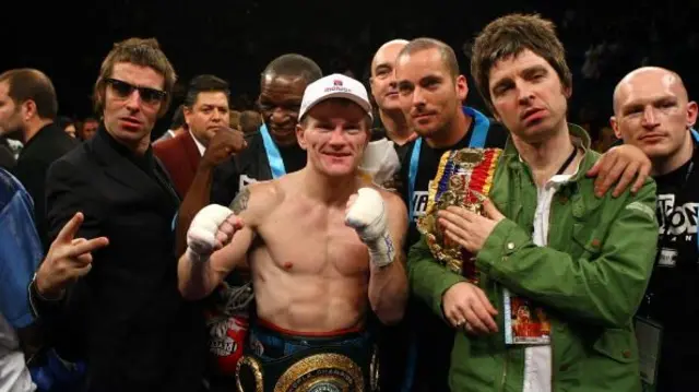 Ricky Hatton with his gloves on flanked by Noel and Liam Gallagher