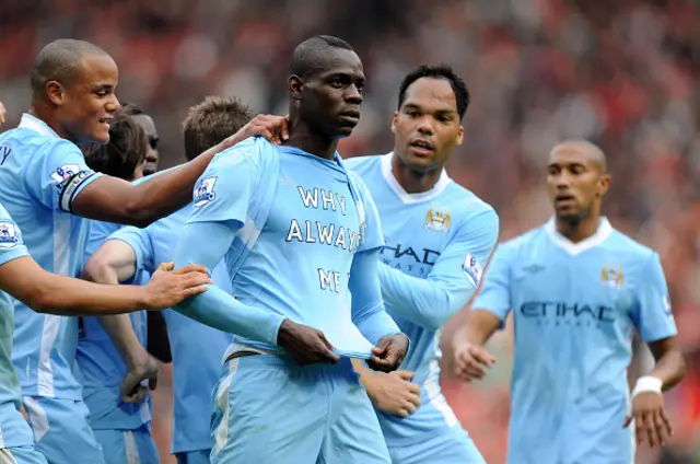 Mario Balotelli displays "Why Always Me?" shirt in the 6-1 victory
