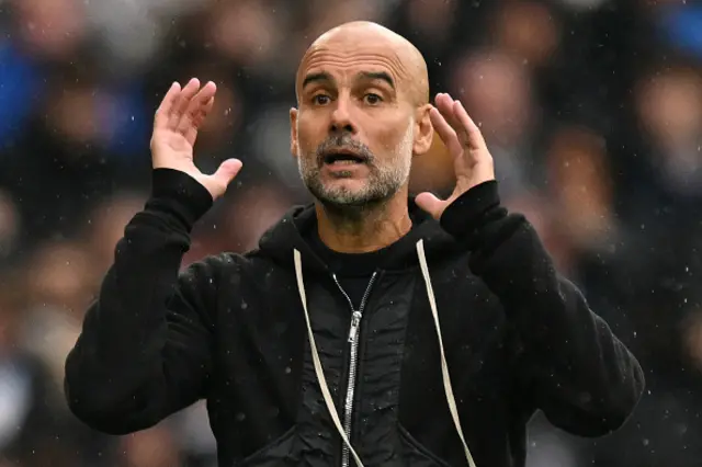 Pep Guardiola gestures