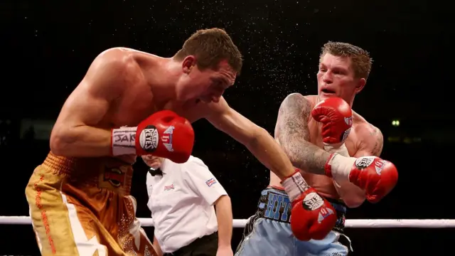 Ricky Hatton of Great Britain (R) in action with Vyacheslav Senchenko of Ukraine during their Welterweight bout at the MEN Arena on November 24, 2012 in Manchester, England
