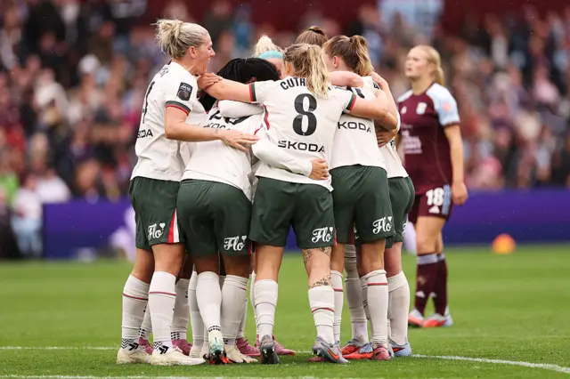 Sam Kerr of Chelsea celebrates scoring her team's third goal with teammates during the Barclays Women's Super League match between Aston Villa and Chelsea FC at Villa Park on September 14, 2025 in Birmingham, England.