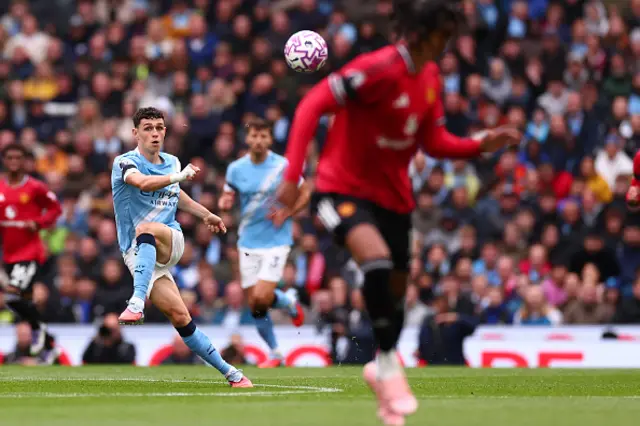 Phil Foden of Manchester City passes the ball