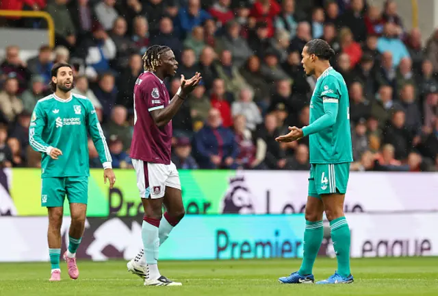 Burnley's Lesley Ugochukwu talks to Liverpool's Virgil van Dijk