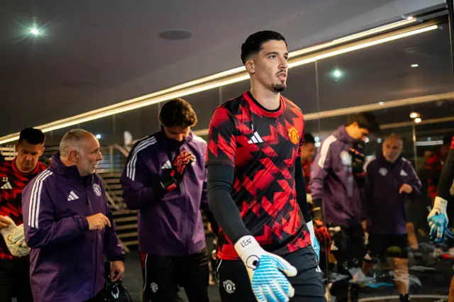 Altay Bayindir of Manchester United warms up
