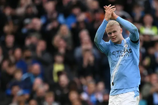 Erling Haaland applauds as he goes off
